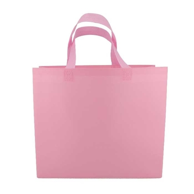 La drogheria ha stampato gli strizzacervelli respirabili non tessuti di rosa 65gsm dei sacchetti della spesa resistenti