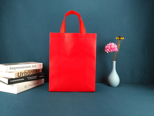 L'acquisto del totalizzatore ricicla non tessuto porta i sacchetti della spesa di drogheria riutilizzabili non tessuti di logo su ordinazione biodegradabile verde delle borse della borsa