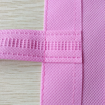 I sacchetti della spesa non tessuti rosa pieghevoli del polipropilene 75gsm restringono resistente