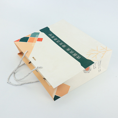 L'acquisto del boutique copre Logo Paper Bag Printed White su ordinazione con la maniglia del nastro